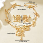 Gold necklace with measurements on a beige background