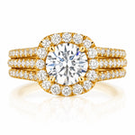 Gold ring with a large diamond and smaller diamonds on a white background