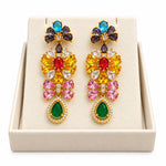 Multicolor crystal drop earrings displayed in a jewelry box
