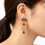 Multicolor crystal drop earrings displayed in a jewelry box