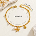 Gold-tone chain anklet with a lobster clasp, starfish charm, pearl bead, and seashell charm, shown on a textured cream background with overlaid size measurements of 21cm/8.27in and 5cm/1.